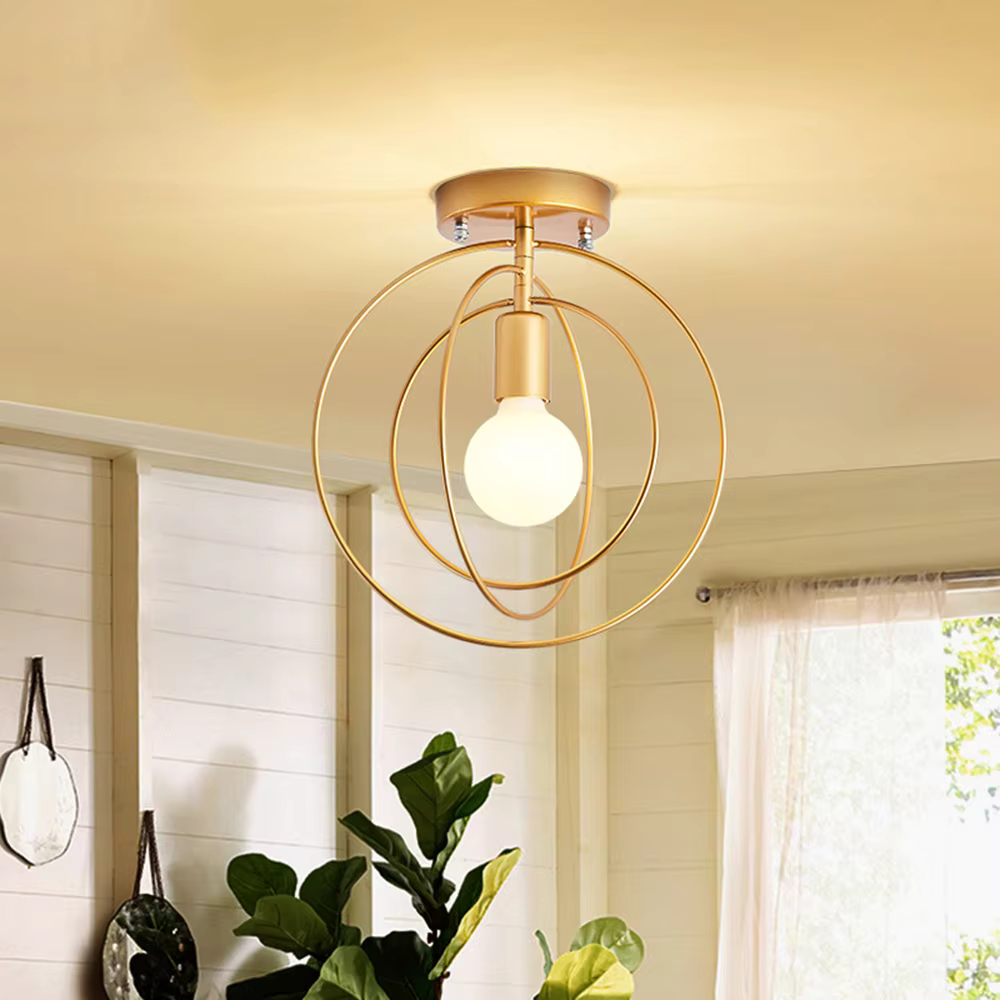 Thaleia - Lampada da soffitto moderna a forma di anello dorato" can be rewritten as:

"Thaleia - Lampada a soffitto moderna con design ad anello dorato