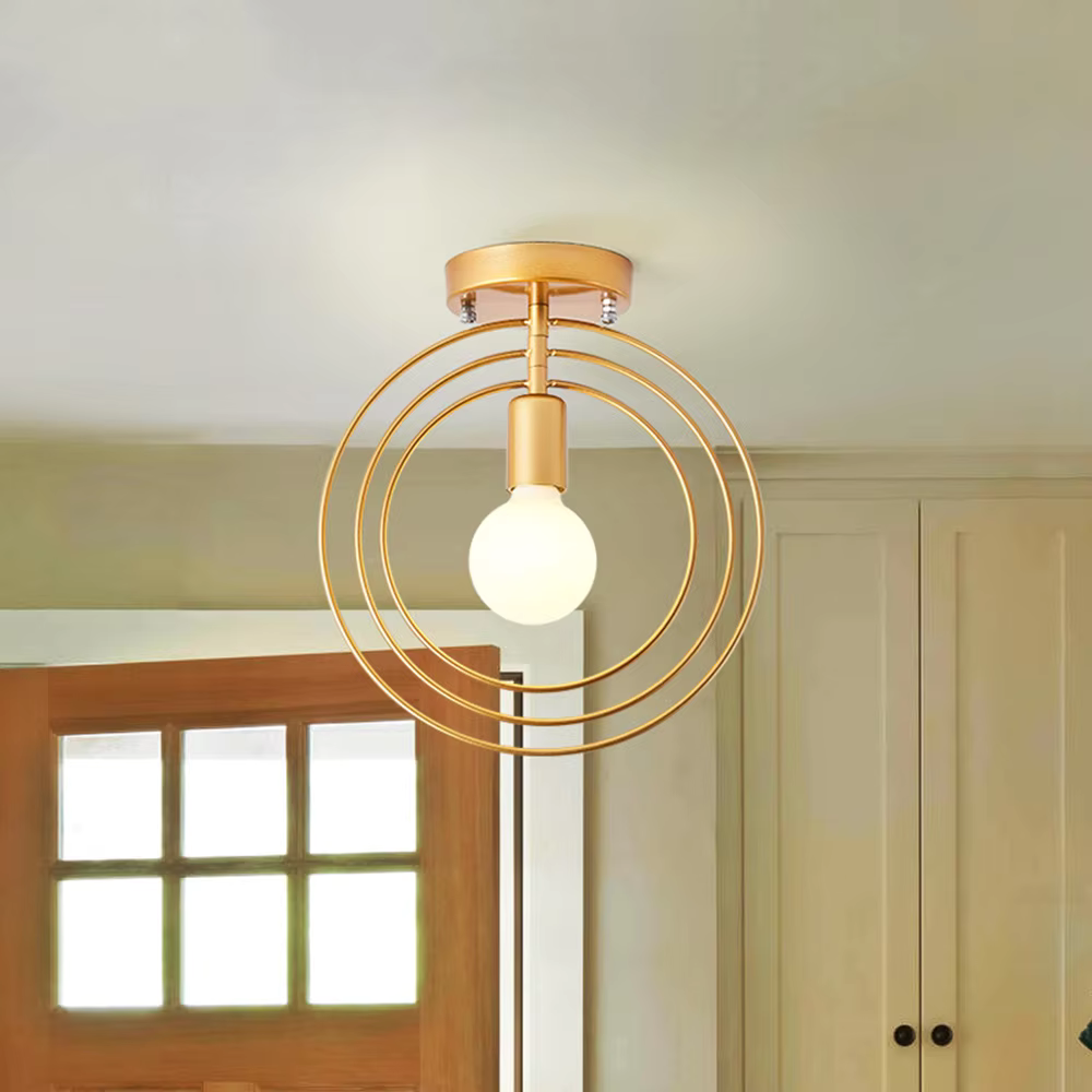 Thaleia - Lampada da soffitto moderna a forma di anello dorato" can be rewritten as:

"Thaleia - Lampada a soffitto moderna con design ad anello dorato