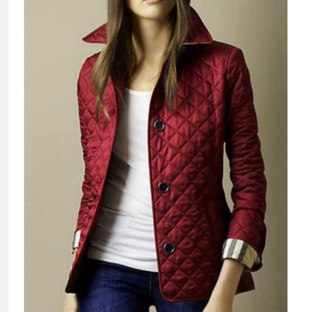 Women's Quilted Bomber Jacket Featuring Button Closure and Convertible Cuffs