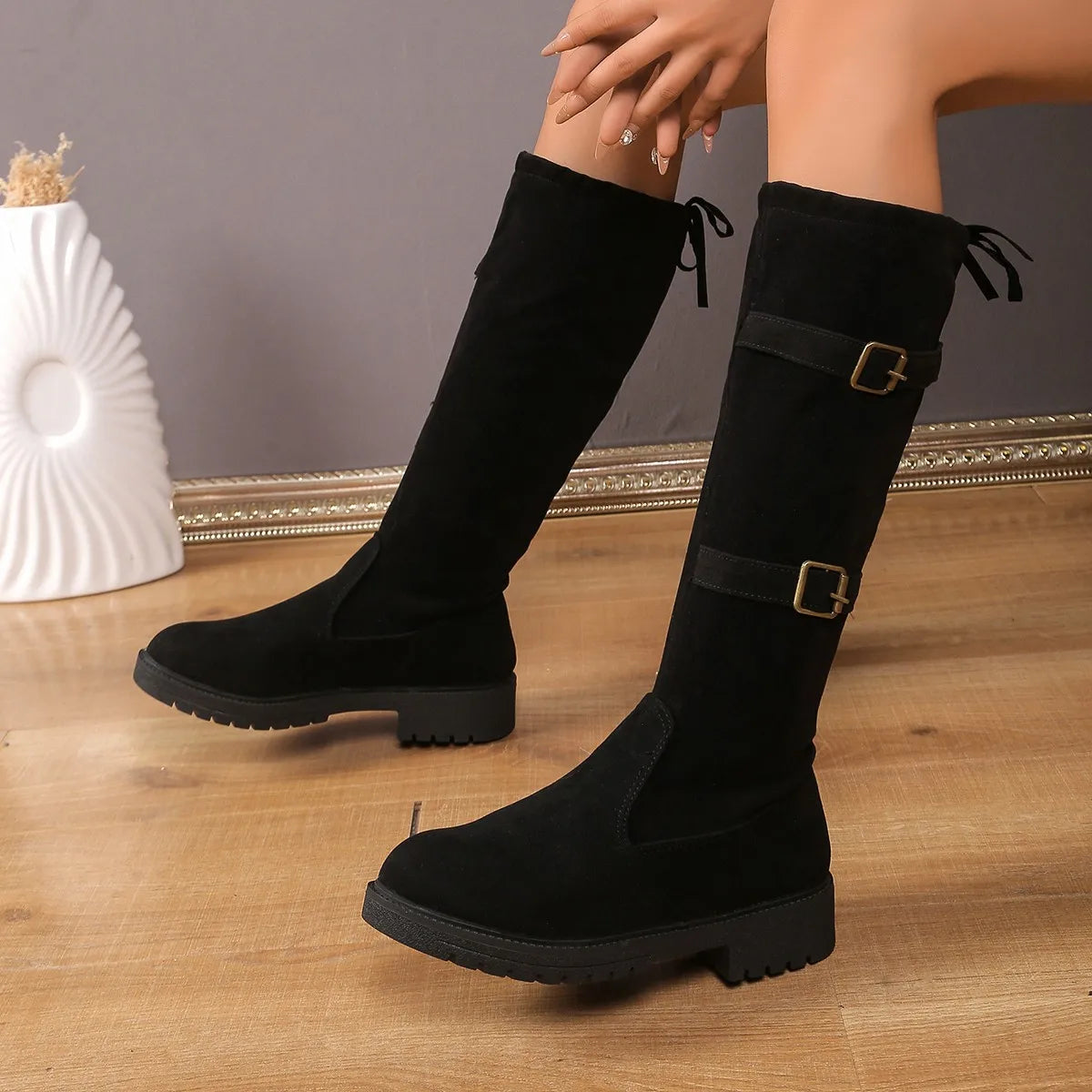 Black Knee-High Boots for Women with a Timeless Silhouette and Low Heels