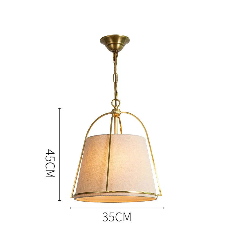 Pallas - Lampada a Sospensione Moderna in Tessuto con Struttura in Ottone" can be rewritten as:

"Pallas - Lampada Sospesa Moderna in Tessuto con Struttura in Ottone