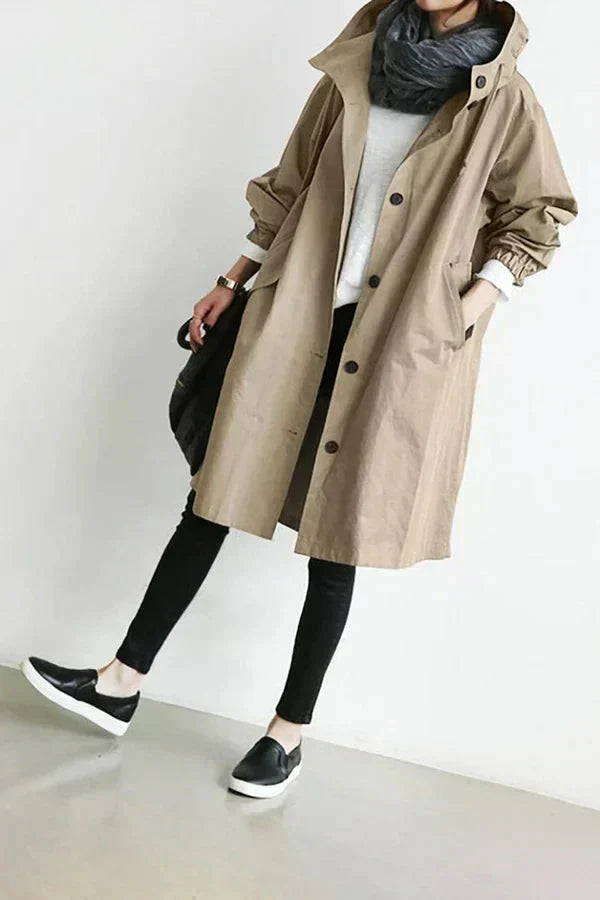 Women's Oversized Hooded Rain Jacket with Button Closure and Pockets