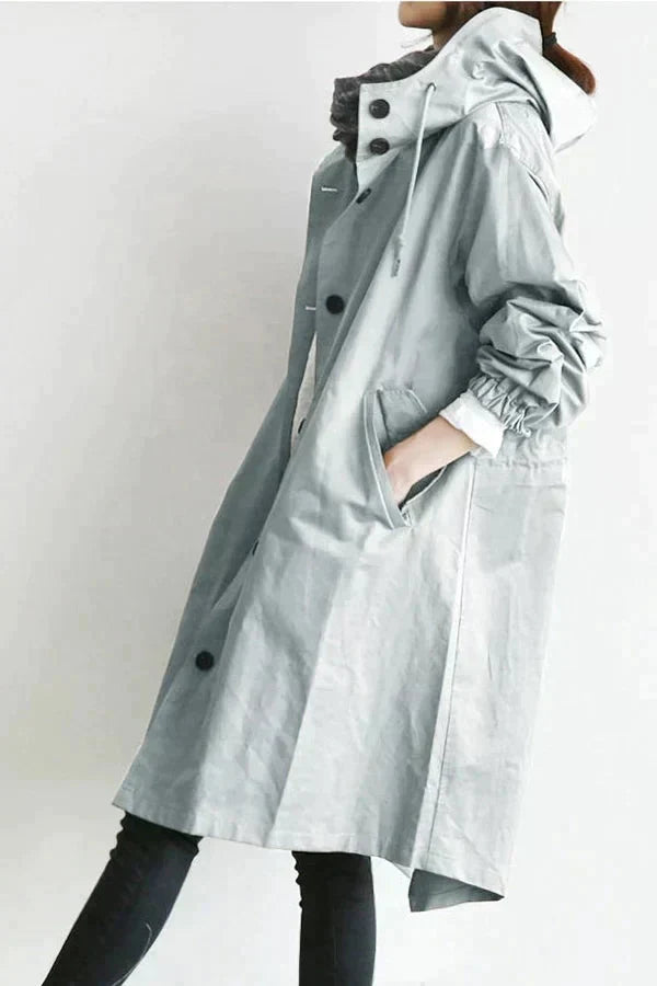 Women's Oversized Hooded Rain Jacket with Button Closure and Pockets