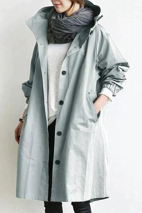 Women's Oversized Hooded Rain Jacket with Button Closure and Pockets