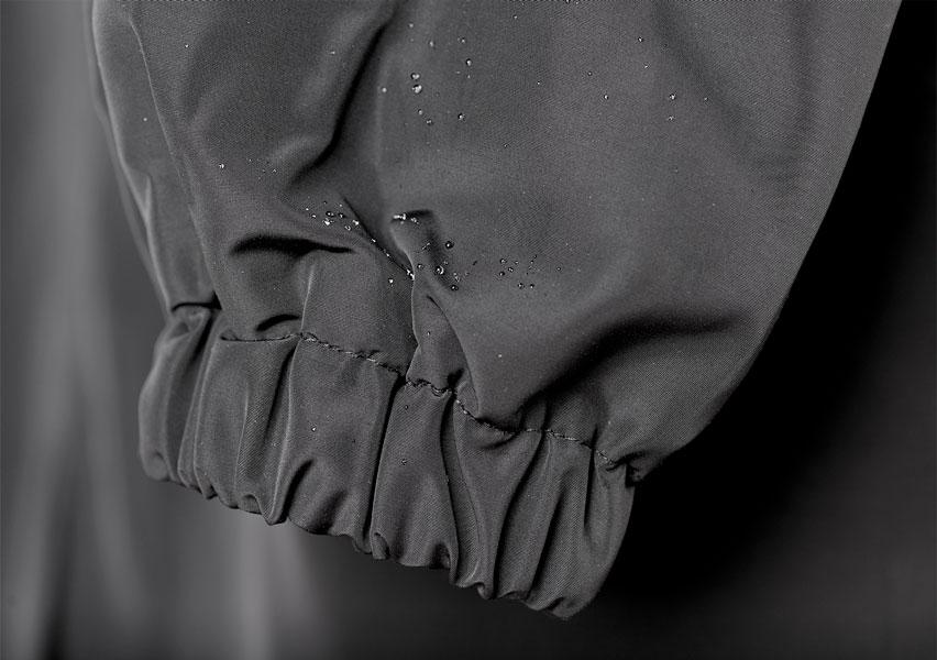Women's Oversized Hooded Rain Jacket with Button Closure and Pockets