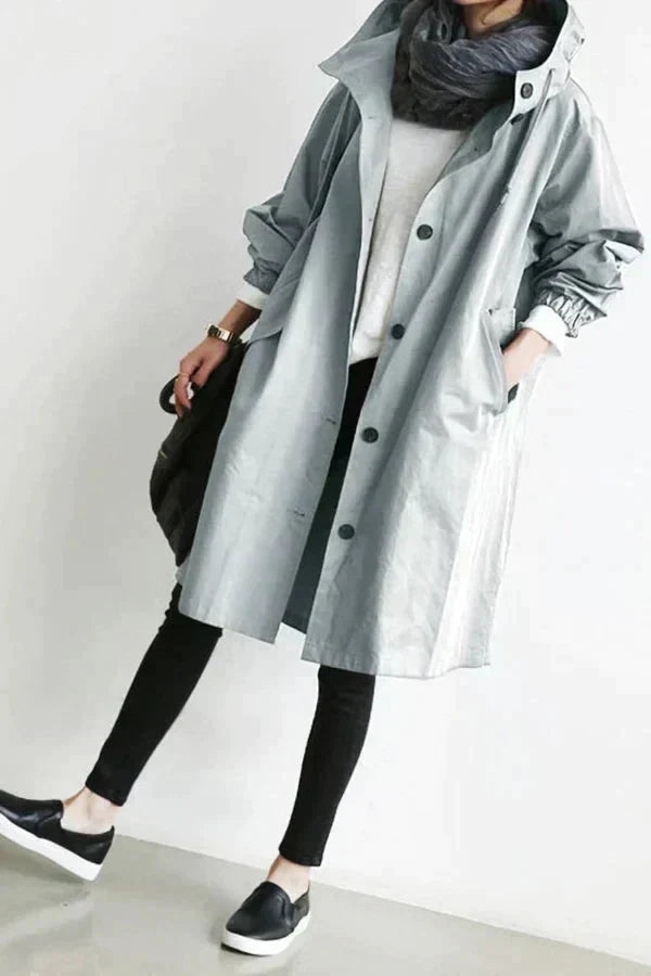 Women's Oversized Hooded Rain Jacket with Button Closure and Pockets