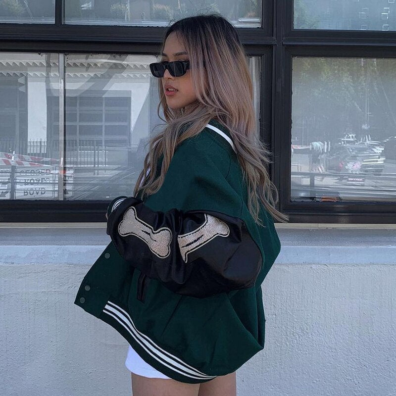 Women's Graphic Varsity Bomber Jacket with Bone-Inspired Sleeve Design